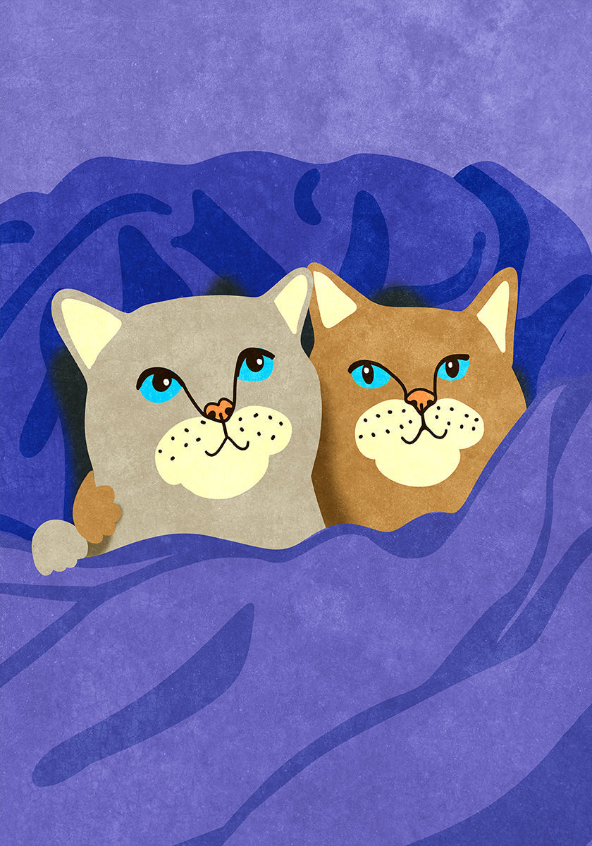 Katzen im Bett